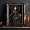 A dark oil painting of a skull in a hooded figure framed in an ornate gold and black picture frame.
