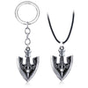 Silver arrow metal keychain featuring an anchor design.