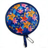 A round fabric fan with a blue background featuring colorful floral patterns in orange, pink, and yellow.