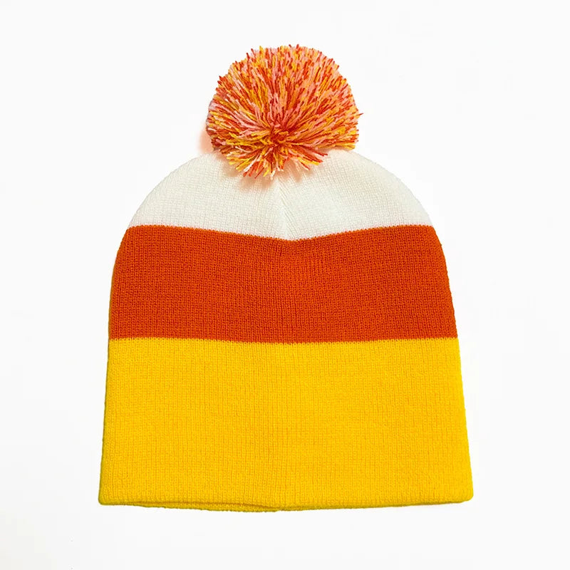 A knitted beanie with horizontal stripes of orange, white, and yellow, topped with a fluffy orange pom-pom.