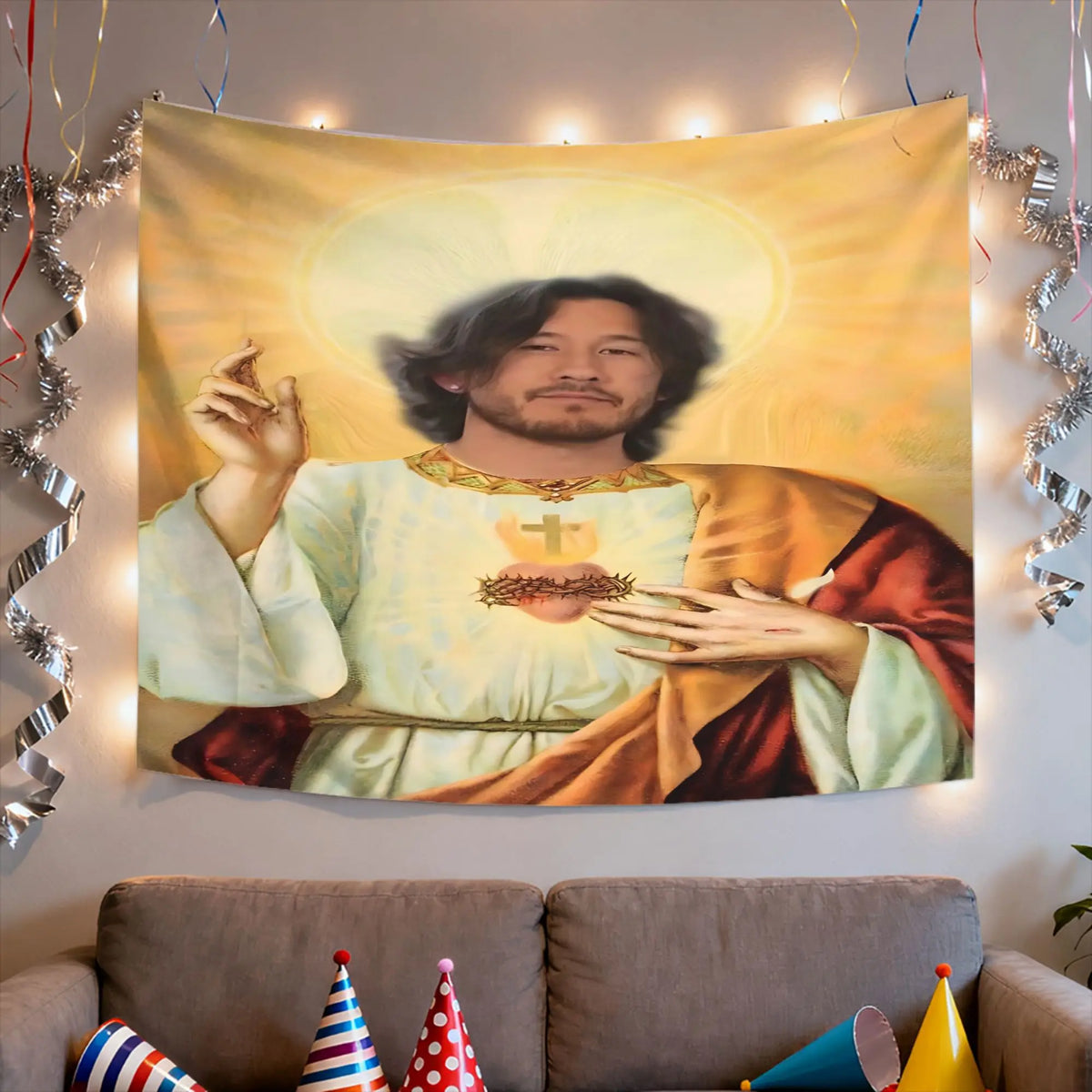 A tapestry wall hanging depicting a figure with dark hair and beard in a golden light.