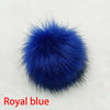 Accessoire boule de cheveux en fausse fourrure bleu royal.