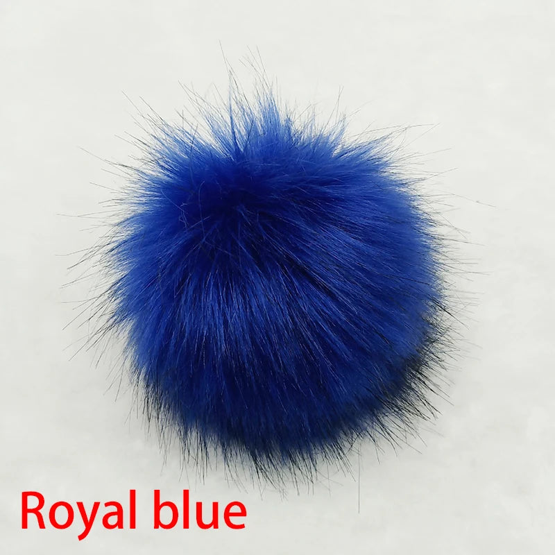 Accessoire boule de cheveux en fausse fourrure bleu royal.