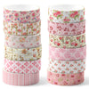 A set of twelve rolls of retro floral themed washi tape in various pink and green patterns.