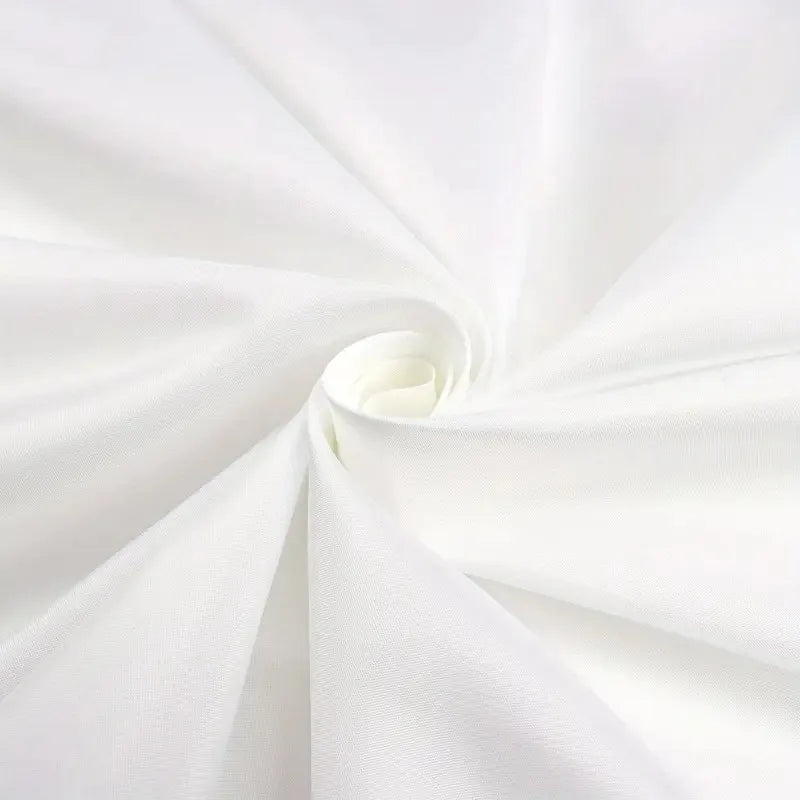 White fabric tapestry of a Jujutsu Kaisen Sukuna anime flag being rolled into a spiral.