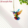 A colorful acrylic hummingbird suncatcher hanging ornament with iridescent wings.