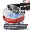 A hand is using a heavy-duty manual can opener with magnetic lid locks to quickly open a large can.