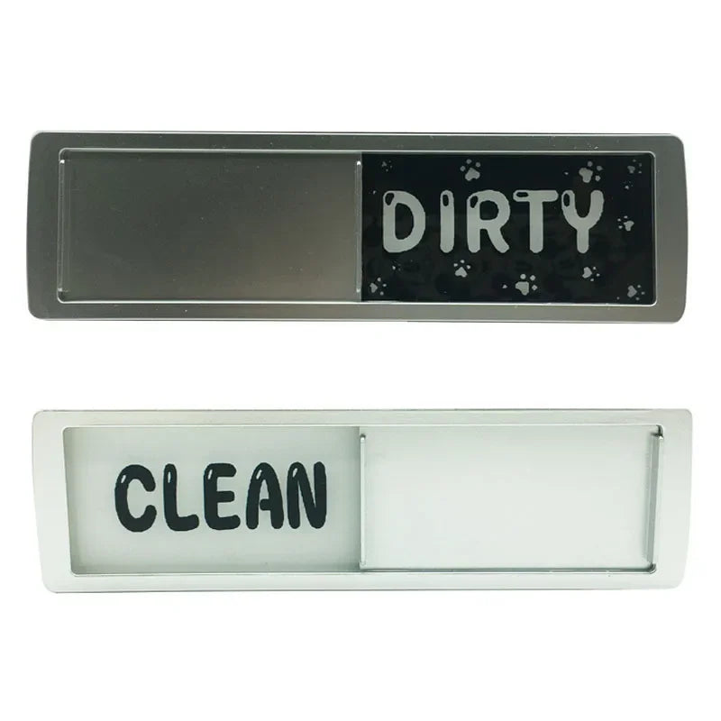 A pair of dishwasher magnet signs showing the words DIRTY on a dark background and CLEAN on a white background.