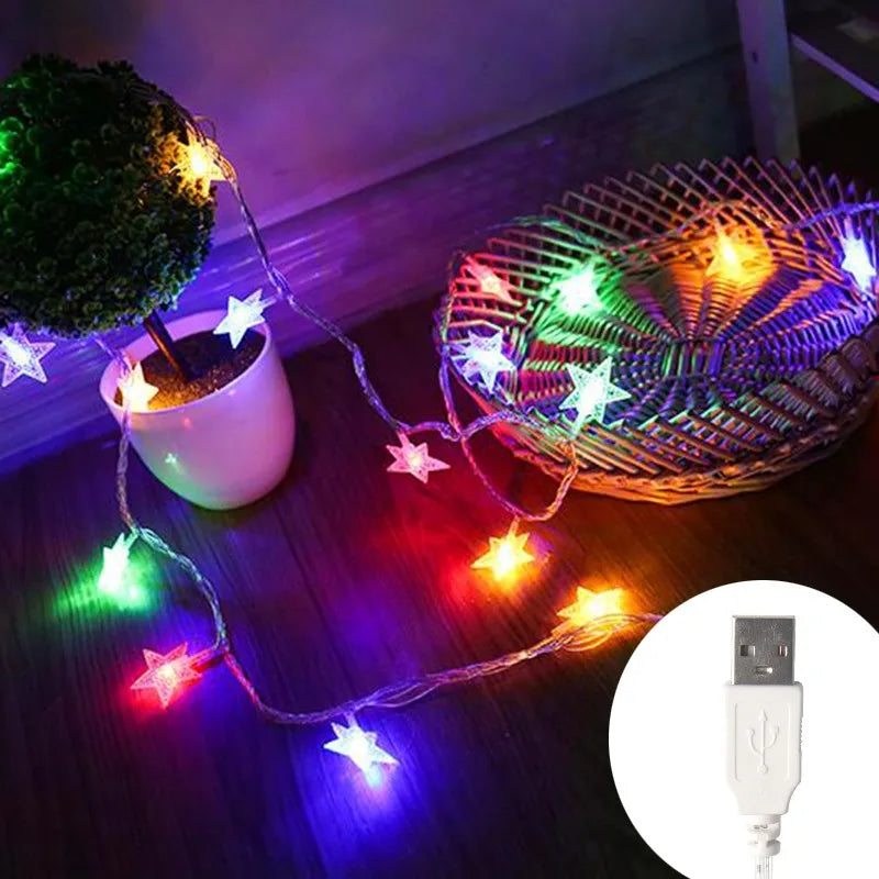 String lights with star-shaped LEDs illuminating a woven basket and a white mug