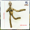 A brown plush doll resembling a skeletal figure with an exaggerated smile, shown standing and posed.
