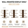 A set of three brown wall-mounted display shelves for storage and decoration.