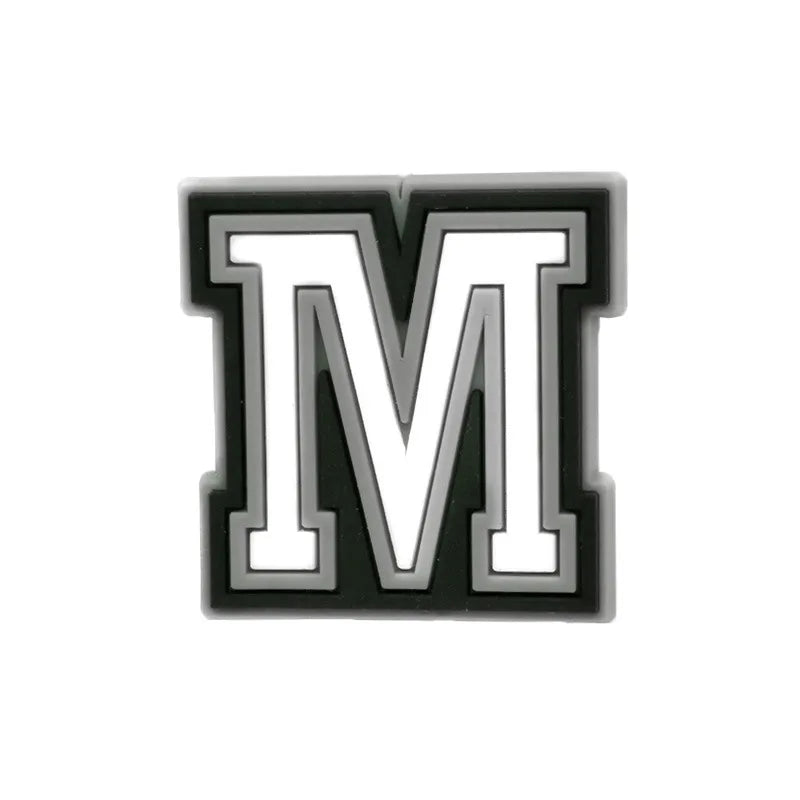 Charm ou accessoire lettre M en alphabet noir et blanc.