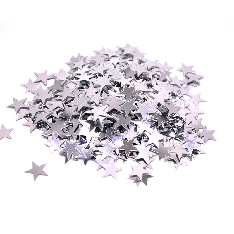 Piles de confettis en acrylique laser argentés et dorés en forme d'étoiles