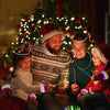 A family of three celebrating with colorful glow sticks and bracelets in a festive holiday setting.