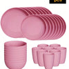 A set of 32 pink reusable plastic tableware items including plates and cups.