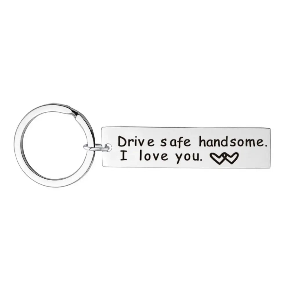 Silver stainless steel keychain engraved with the message Drive safe handsome I love you