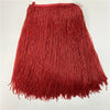 A vibrant red tassel fringe trim for curtains and DIY projects, displayed flat.