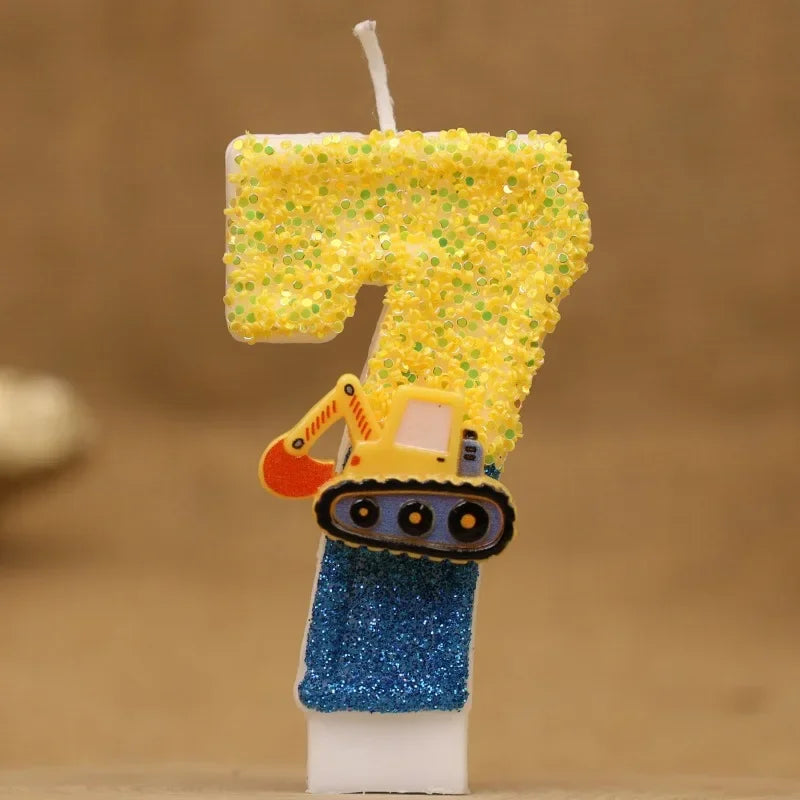 A yellow glitter cake candle shaped like the number 7, mounted on a blue base.