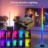 A guitar player is playing while a vertical RGB light illuminates the scene, demonstrating pickup rhythm lighting.