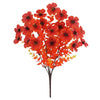 A spray of vibrant artificial pansy flowers in shades of orange and red on a dark stem.