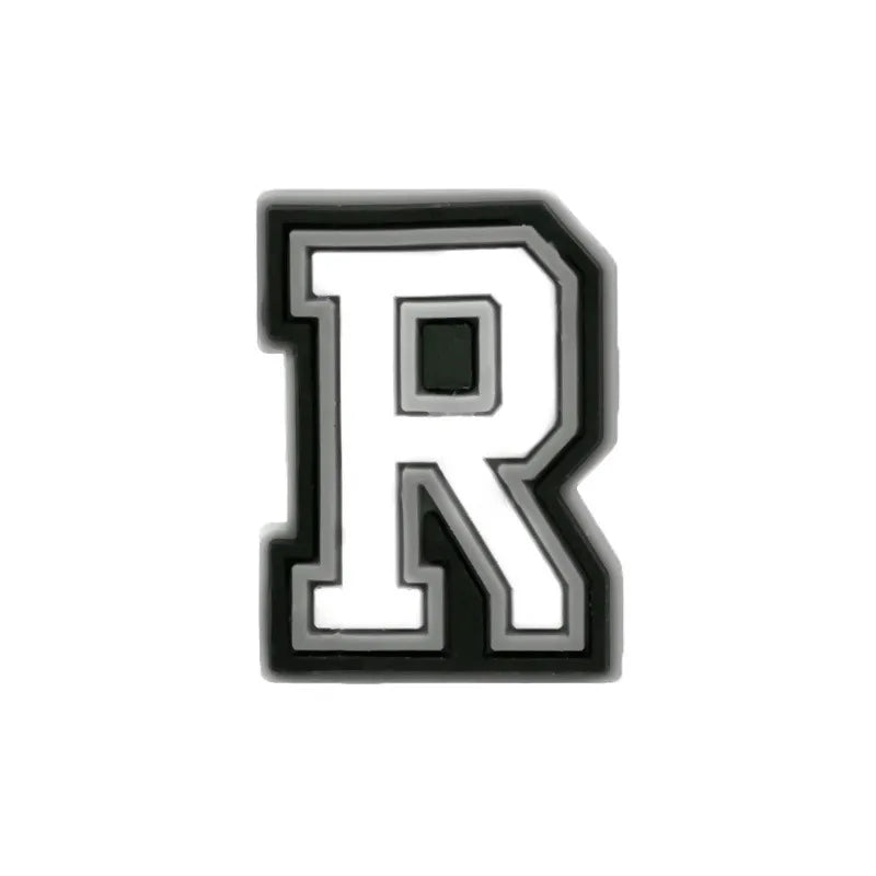 Charm in the shape of the letter R, black and white alphabet letter shoe charm.