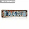 A rectangular vintage rusted metal sign with the text GO ON GIT for wall decor.