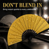 A close-up of a gold glitter hand fan opening, set against a dark background with other fans visible.