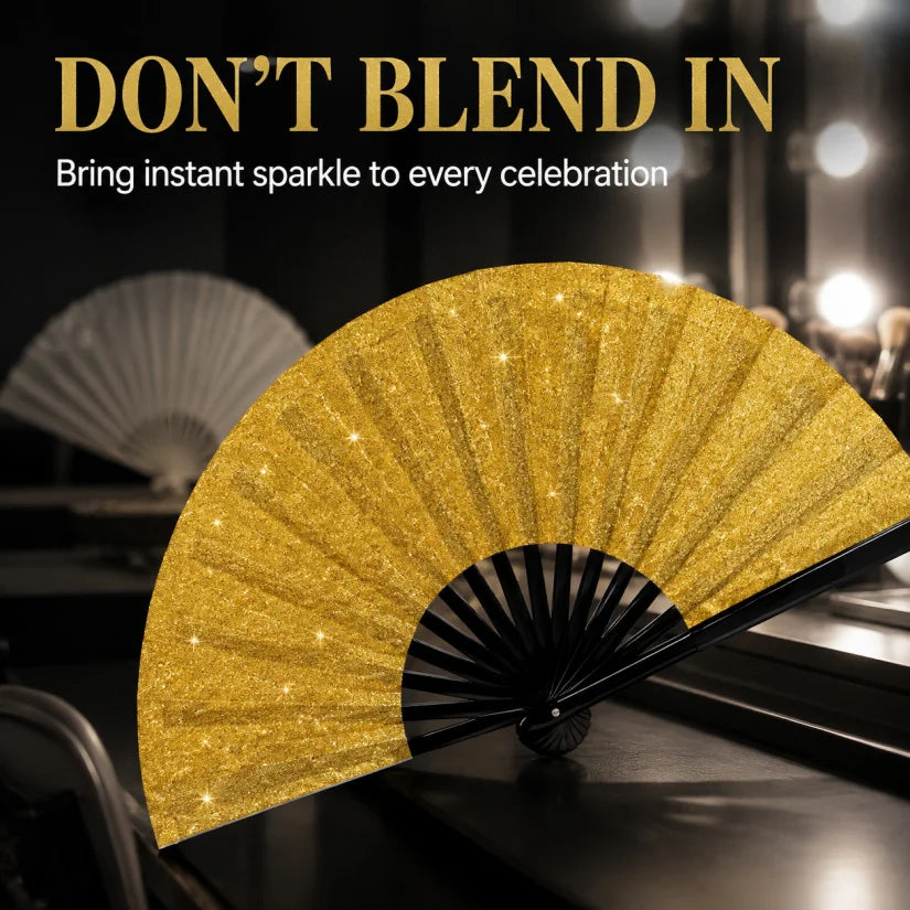 A close-up of a gold glitter hand fan opening, set against a dark background with other fans visible.