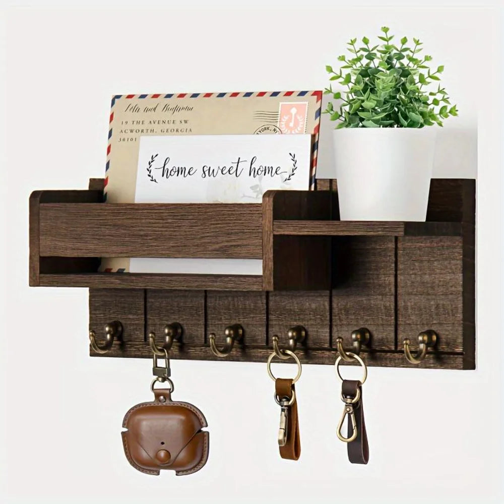 A wooden key holder with six hooks and a mail sorter featuring various keys and cards.