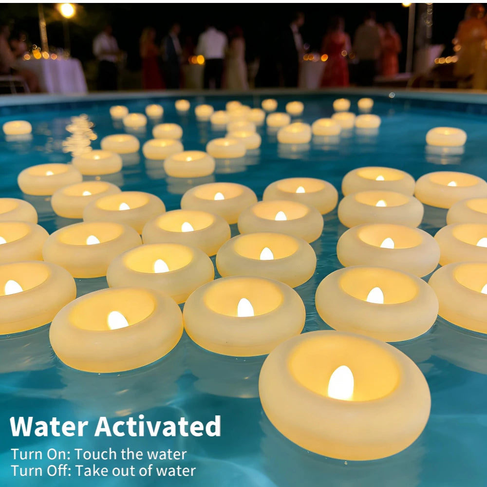 Water activated floating candles glowing warmly in blue water