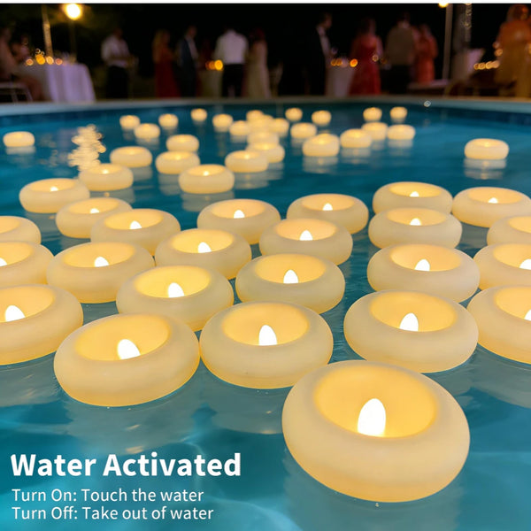 Water activated floating candles glowing warmly in blue water