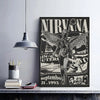 A black and white vintage poster featuring the word NIRVANA and an angelic figure with wings.