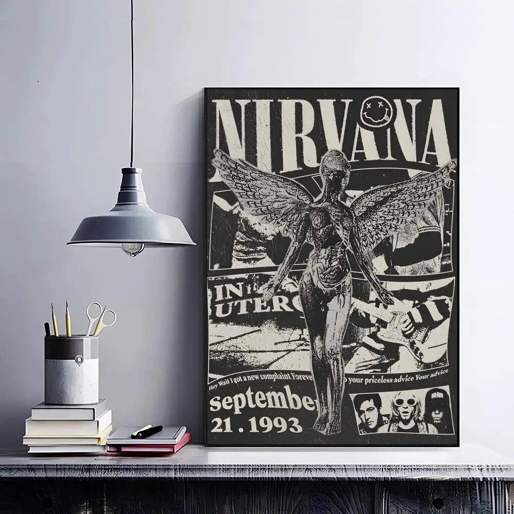 A black and white vintage poster featuring the word NIRVANA and an angelic figure with wings.