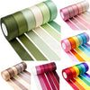 A collection of satin silk ribbons in various shades of green, pink, orange, and yellow rolled for crafting.