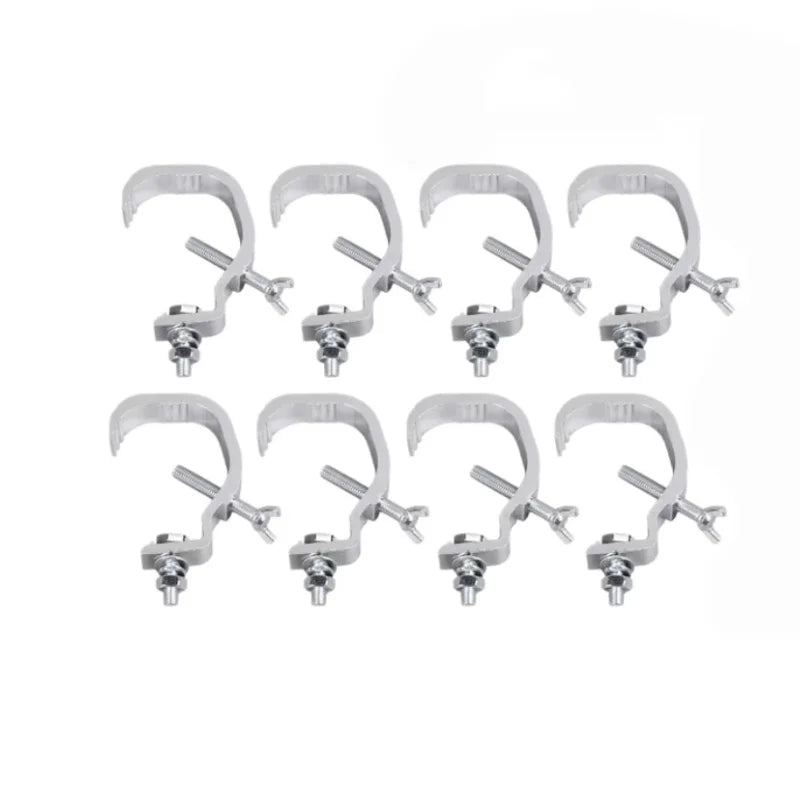 A set of aluminum C-clamp hooks used for stage lighting trusses.
