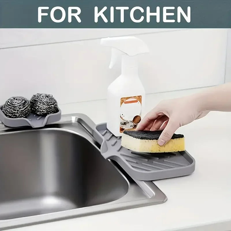 A silicone faucet splash guard and drying mat are shown next to a hand using the product in a kitchen sink.