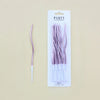 A package of 12 long, thin, purple spiral candles for parties.