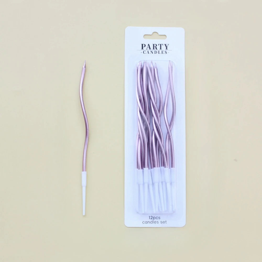 A package of 12 long, thin, purple spiral candles for parties.