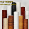 Rolls of self-adhesive PVC wallpaper featuring various wood grain colors and textures.
