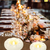 Two white ceramic floating LED tealight candles shown with dimensions 7.5cm and 5.5cm.