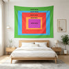 A vibrant green wall tapestry featuring nested square frames in blue, red, and orange tones above a wooden bed.