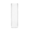 A clear glass cylinder vase for hydroponic plants or flower wrapping.