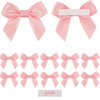 A set of pink satin ribbon bows with self-adhesive backing for crafting and gift wrapping.