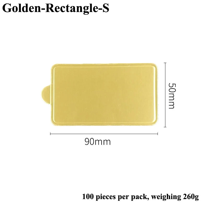 A rectangular, light yellow dessert cake board labeled Golden-Rectangle-S, measuring 90mm by 50mm.