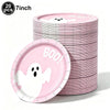 A stack of pink ghost-themed plates and bowls for a Halloween party.