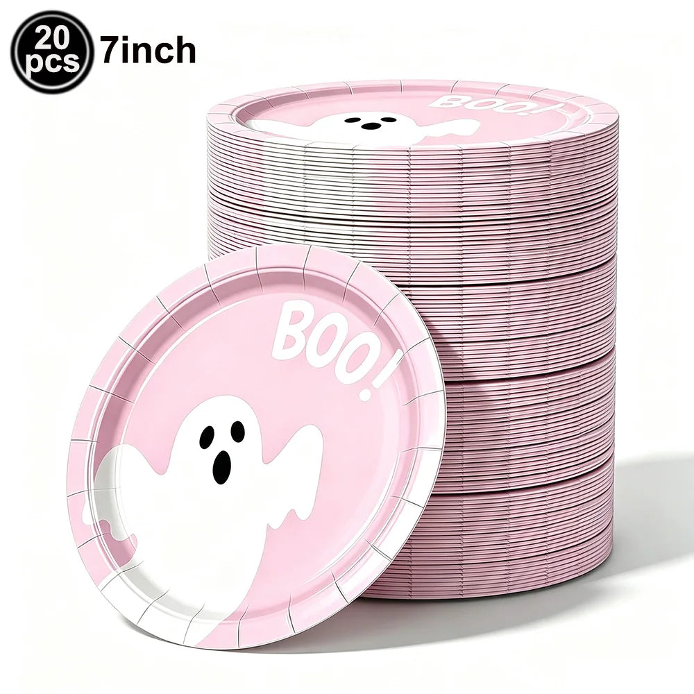 A stack of pink ghost-themed plates and bowls for a Halloween party.