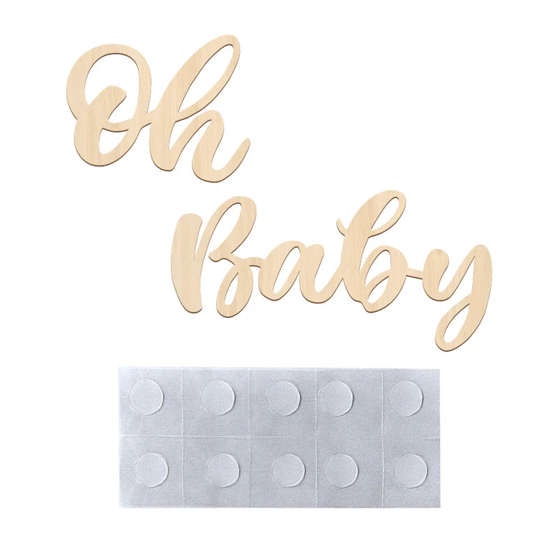 Wooden script letters Oh Baby for a baby shower or gender reveal party decor