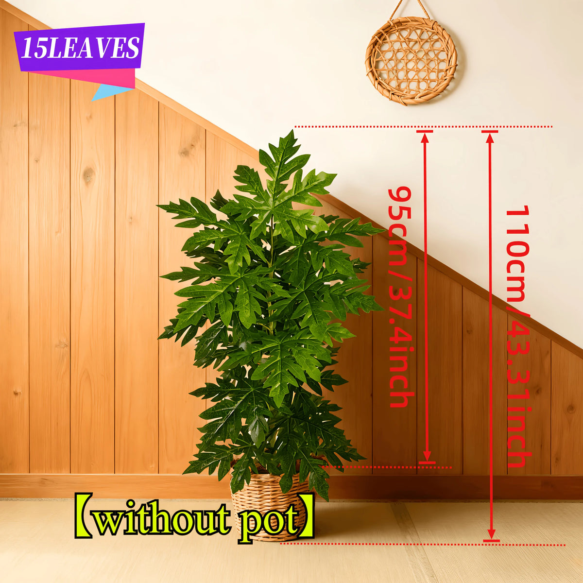 A vibrant green artificial papaya leaf plant with 15 leaves displayed against a wooden cabinet and a staircase.