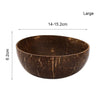 A large, dark brown natural coconut shell serving bowl with visible grain lines.