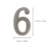 A silver magnetic house number shaped like the numeral six, measuring 7.0cm by 4.2cm.